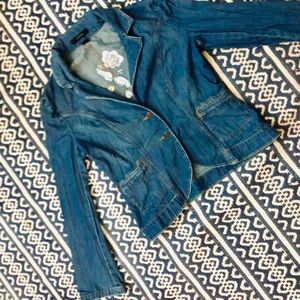 Express jean jacket with floral embroidery